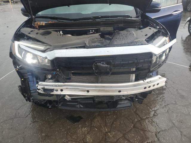 Photo 11 from auction – 2023 HONDA RIDGELINE with VIN 5FPYK3F7XPB057005