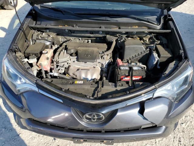 Photo 12 from auction – 2018 TOYOTA RAV4 LE with VIN JTMBFREV6JD252040