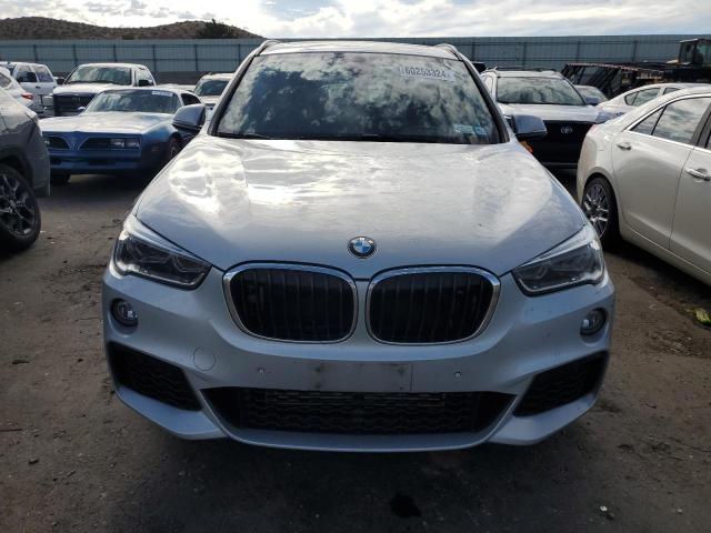 Photo 5 from auction – 2017 BMW X1 XDRIVE2 with VIN WBXHT3C34H5F80651