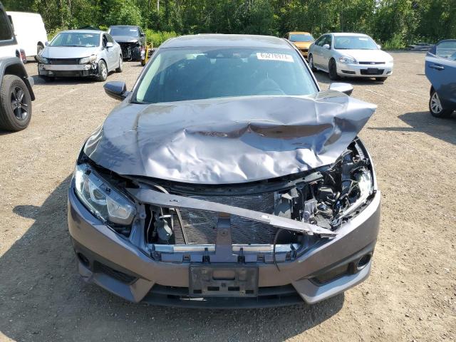 Photo 5 from auction – 2018 HONDA CIVIC LX with VIN 2HGFC2F68JH032458