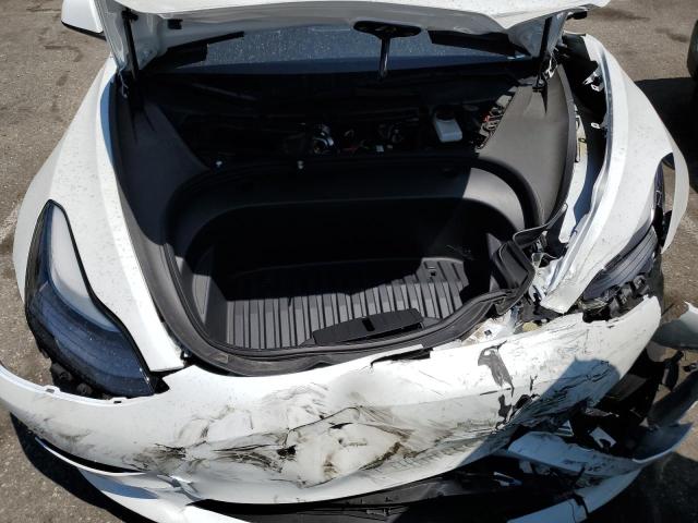 Photo 11 from auction – 2023 TESLA MODEL 3 with VIN 5YJ3E1EA3PF428114