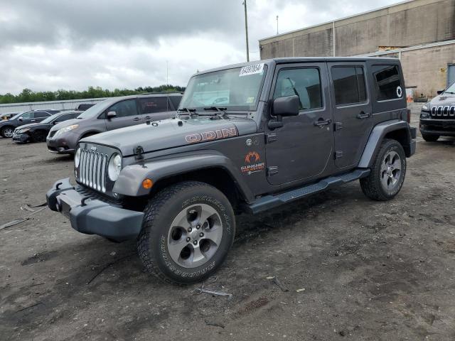 JEEP WRANGLER U 2016 with VIN 1C4HJWEGXGL174658 - Photo from auction