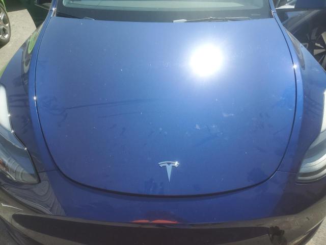 Photo 11 from auction – 2022 TESLA MODEL Y with VIN 7SAYGDEF5NF564323
