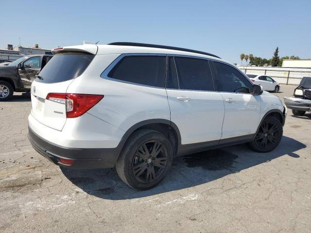 Photo 3 from auction – 2021 HONDA PILOT SE with VIN 5FNYF5H21MB014355