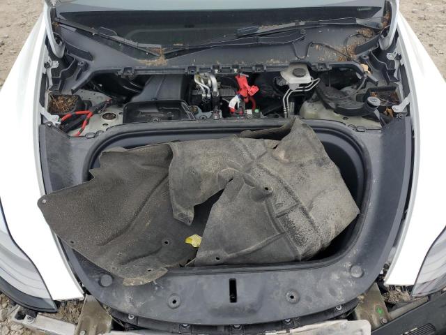 Photo 11 from auction – 2023 TESLA MODEL Y with VIN 7SAYGDEE0PF674576