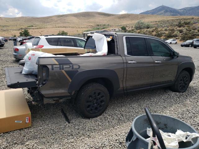 Photo 3 from auction – 2022 HONDA RIDGELINE with VIN 5FPYK3F79NB011565