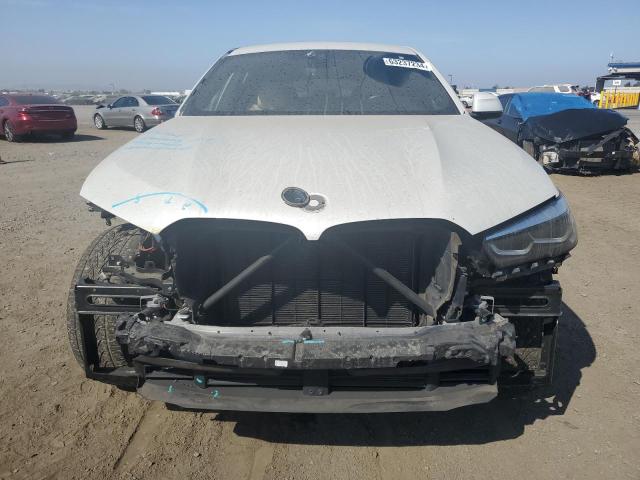 Photo 5 from auction – 2021 BMW X6 SDRIVE with VIN 5UXCY4C06M9G70924