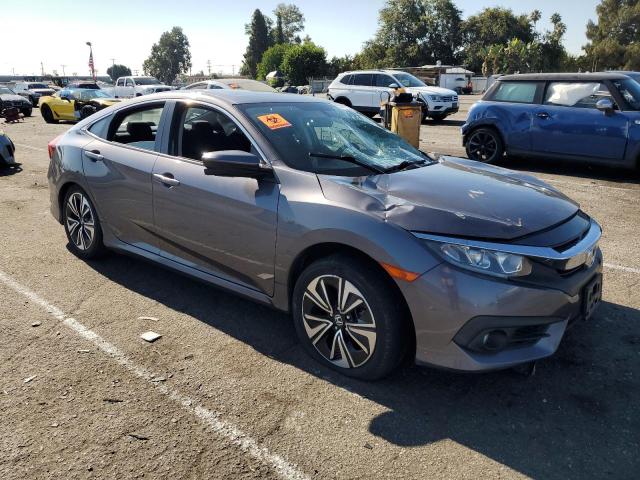 Photo 4 from auction – 2017 HONDA CIVIC EX with VIN 2HGFC1F31HH631857