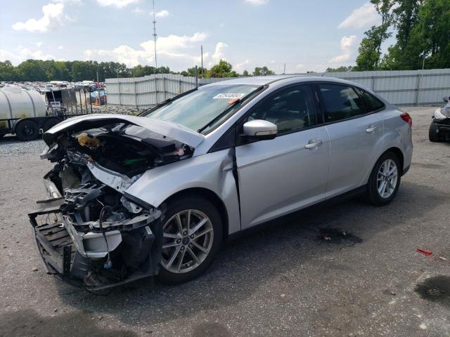 FORD FOCUS SE 2016 with VIN 1FADP3F27GL352899 - Photo from auction