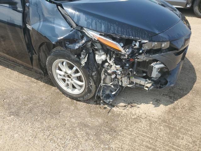 Photo 9 from auction – 2021 TOYOTA PRIUS PRIM with VIN JTDKAMFP0M3196642