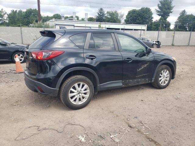 Photo 3 from auction – 2014 MAZDA CX-5 TOURI with VIN JM3KE2CY8E0391579