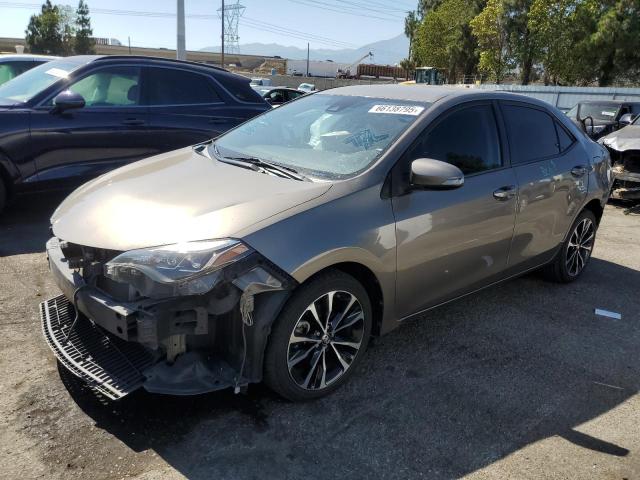 TOYOTA COROLLA L 2018 with VIN 5YFBURHEXJP854504 - Photo from auction