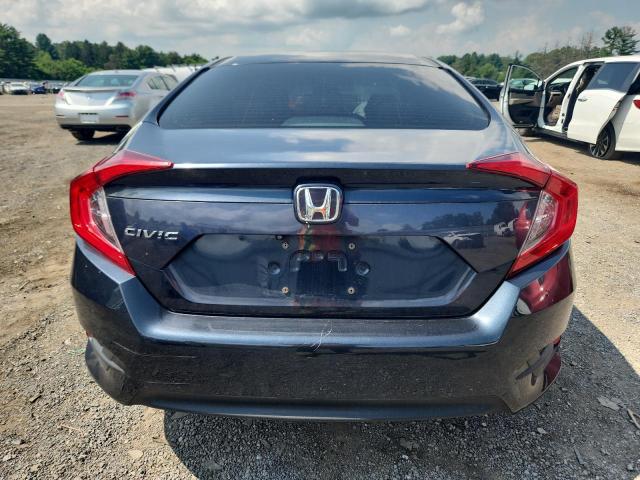 Photo 6 from auction – 2017 HONDA CIVIC LX with VIN 2HGFC2F58HH556811