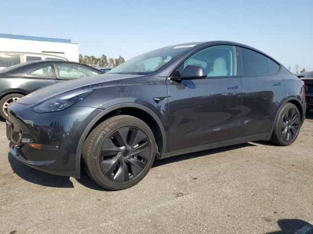 TESLA MODEL Y 2024 with VIN 7SAYGAEE5RF098615 - Photo from auction