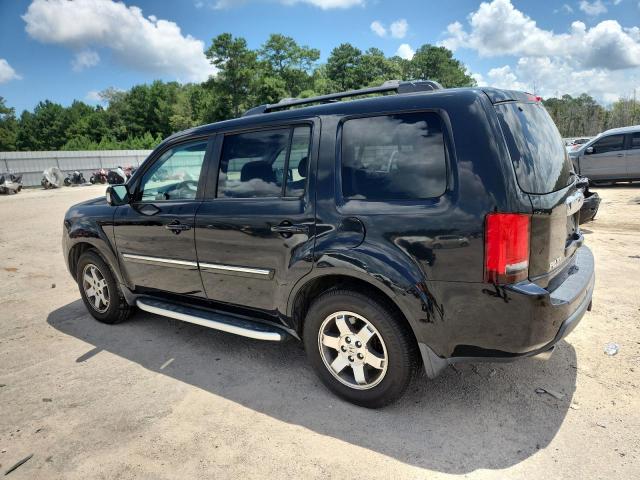 Photo 2 from auction – 2011 HONDA PILOT TOUR with VIN 5FNYF4H96BB102399