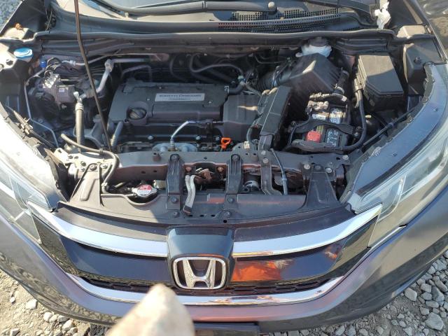 Photo 12 from auction – 2015 HONDA CR-V LX with VIN 5J6RM4H37FL048081
