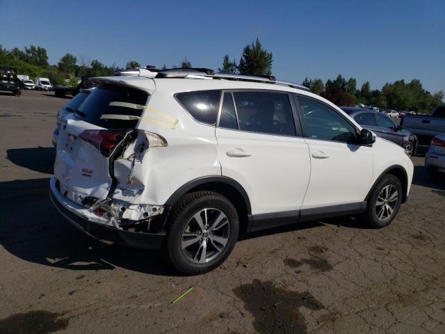 Photo 3 from auction – 2016 TOYOTA RAV4 XLE with VIN JTMRFREV4GJ069373