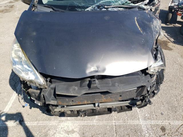Photo 11 from auction – 2014 TOYOTA PRIUS C with VIN JTDKDTB3XE1567355