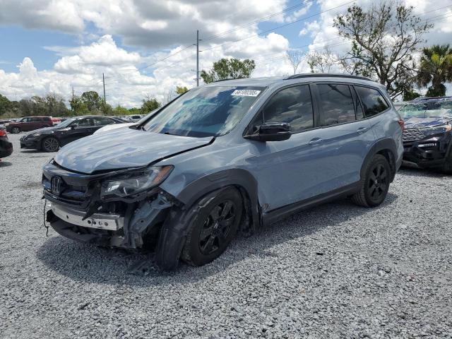 HONDA PILOT TRAI 2022 with VIN 5FNYF6H8XNB062979 - Photo from auction