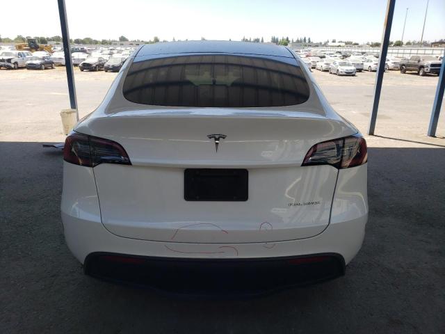 Photo 6 from auction – 2023 TESLA MODEL Y with VIN 7SAYGDEE0PF812021