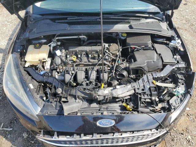 Photo 11 from auction – 2016 FORD FOCUS SE with VIN 1FADP3F21GL228871