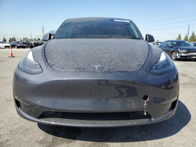 Photo 5 from auction – 2023 TESLA MODEL Y with VIN 7SAYGAEE3PF674067