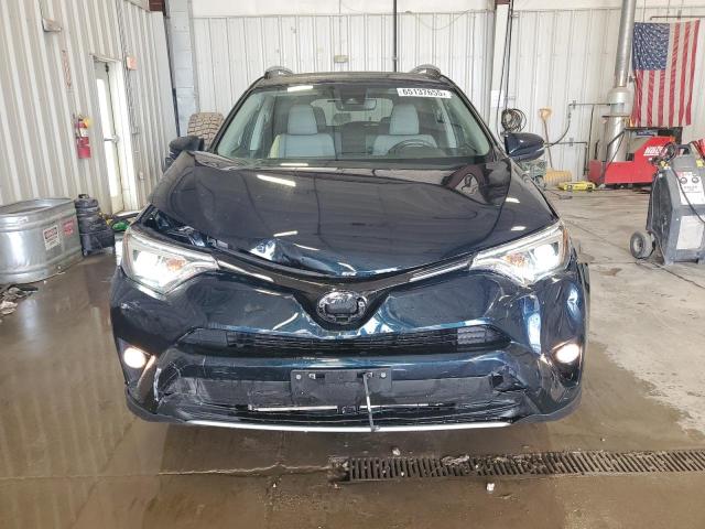 Photo 5 from auction – 2018 TOYOTA RAV4 LIMIT with VIN JTMDFREV5JD258176