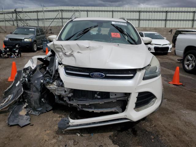 Photo 5 from auction – 2016 FORD ESCAPE TIT with VIN 1FMCU0J98GUC79470