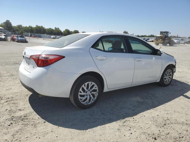 Photo 3 from auction – 2017 TOYOTA COROLLA L with VIN 5YFBURHE1HP711774