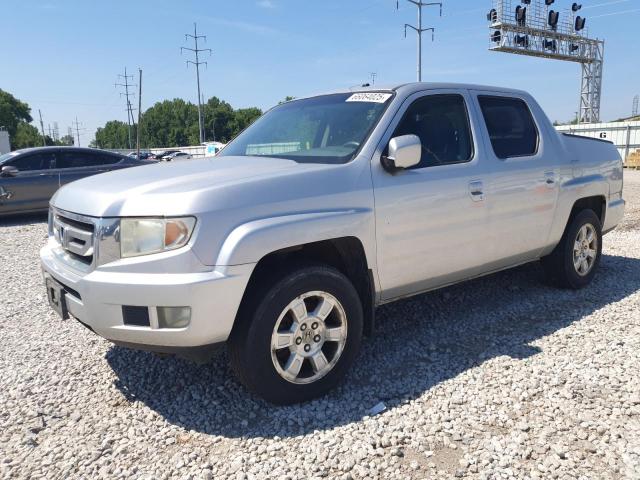 HONDA RIDGELINE 2011 with VIN 5FPYK1F4XBB453230 - Photo from auction