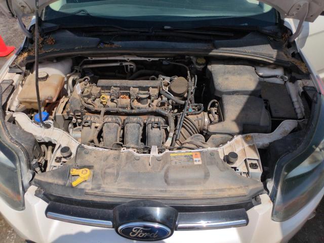 Photo 11 from auction – 2012 FORD FOCUS TITA with VIN 1FAHP3N27CL467239