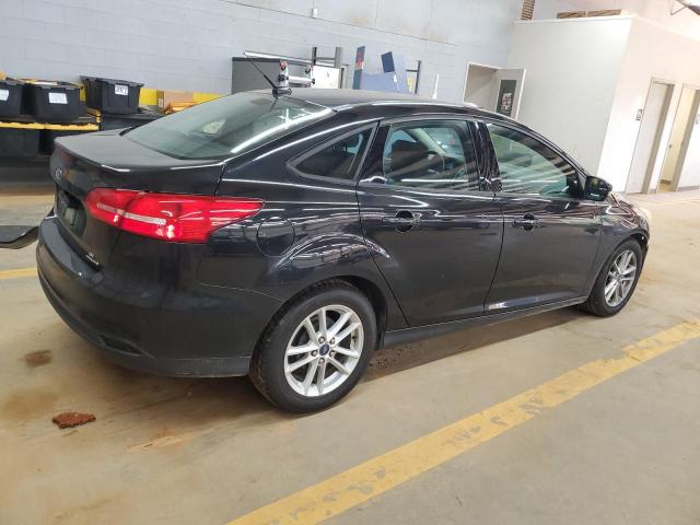 Photo 3 from auction – 2015 FORD FOCUS SE with VIN 1FADP3F21FL259181