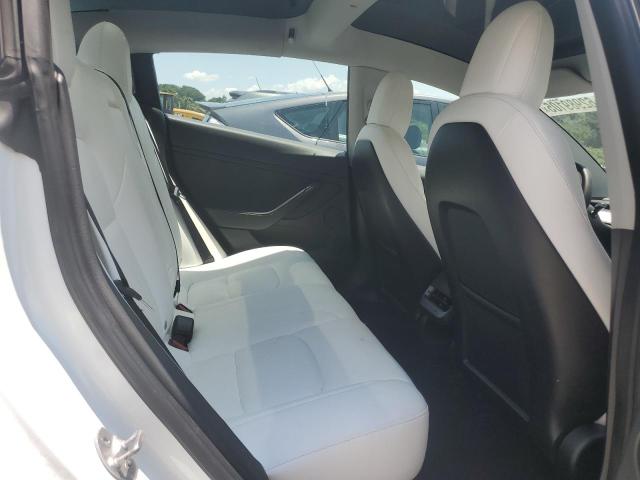 Photo 10 from auction – 2021 TESLA MODEL 3 with VIN 5YJ3E1EA2MF096033