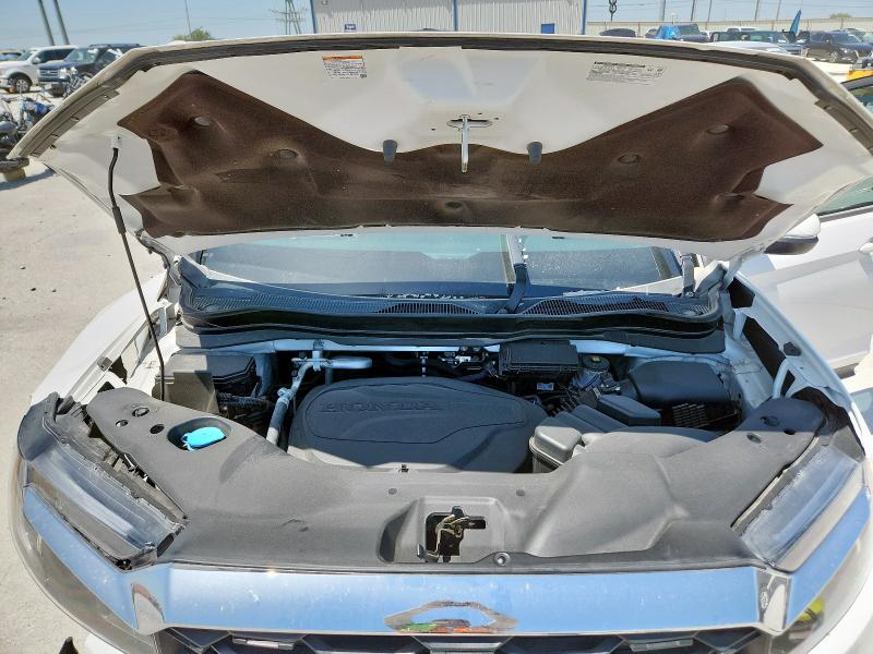Photo 12 from auction – 2023 HONDA PASSPORT E with VIN 5FNYF8H51PB029793