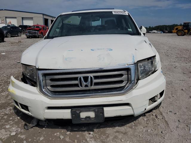 Photo 5 from auction – 2014 HONDA RIDGELINE with VIN 5FPYK1F54EB012075