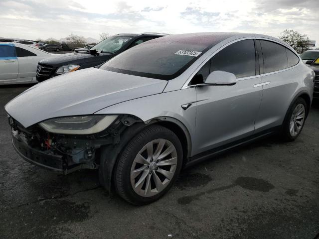 TESLA MODEL X 2017 with VIN 5YJXCAE28HF054052 - Photo from auction