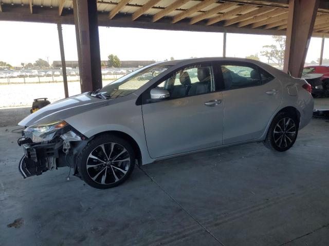 TOYOTA COROLLA L 2017 with VIN 5YFBURHEXHP680945 - Photo from auction