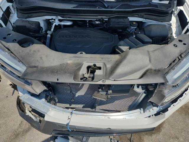 Photo 12 from auction – 2023 HONDA PASSPORT E with VIN 5FNYF8H05PB037156