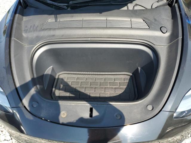 Photo 12 from auction – 2023 TESLA MODEL Y with VIN 7SAYGDEE2PA060139
