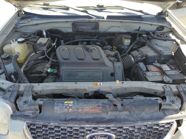 Photo 12 from auction – 2003 FORD ESCAPE LIM with VIN 1FMCU04103KB76166