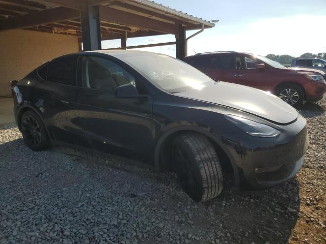Photo 4 from auction – 2023 TESLA MODEL Y with VIN 7SAYGDED1PF967006
