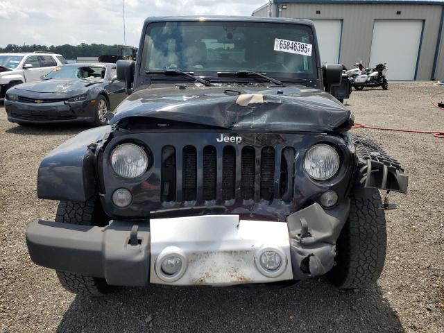 Photo 5 from auction – 2015 JEEP WRANGLER U with VIN 1C4BJWEG4FL529540