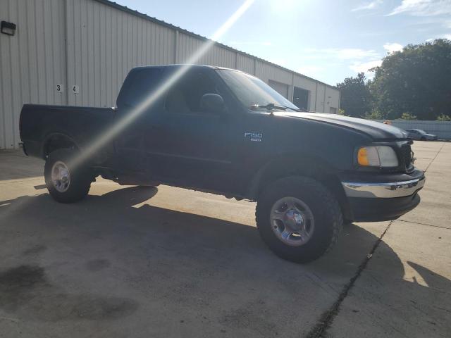 Photo 4 from auction – 2000 FORD F150 with VIN 1FTRX18L9YNB19395