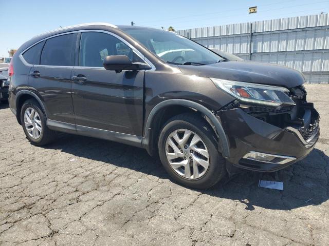 Photo 4 from auction – 2015 HONDA CR-V EXL with VIN 2HKRM3H79FH549366