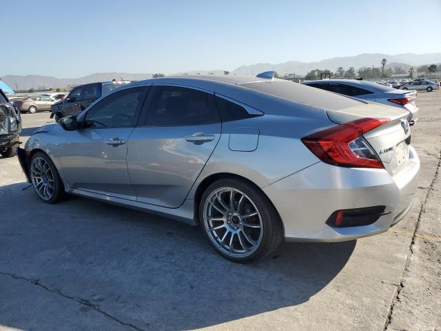 Photo 2 from auction – 2018 HONDA CIVIC EX with VIN 19XFC2F73JE204558