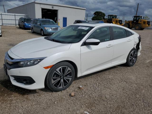 HONDA CIVIC EX 2018 with VIN 19XFC1E31JE004030 - Photo from auction