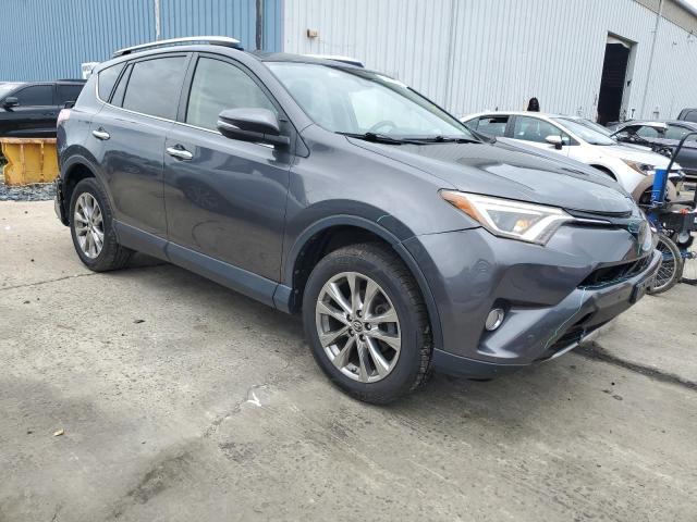 Photo 4 from auction – 2016 TOYOTA RAV4 LIMITED with VIN JTMDFREV6GJ090977