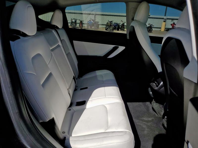 Photo 11 from auction – 2021 TESLA MODEL Y with VIN 5YJYGDED9MF123157