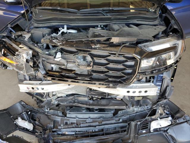 Photo 12 from auction – 2023 HONDA PASSPORT E with VIN 5FNYF8H04PB032224