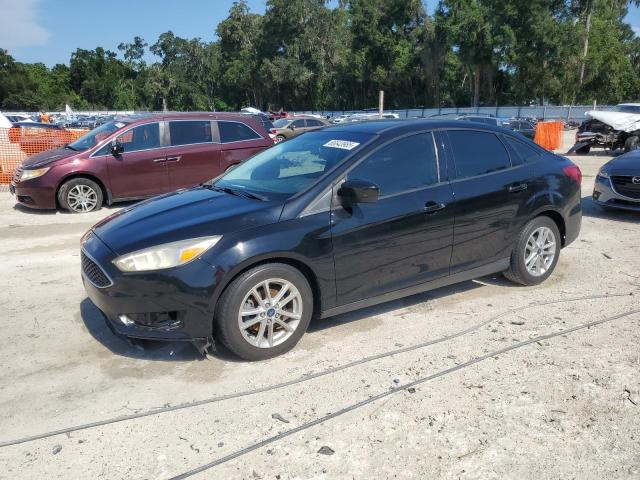 FORD FOCUS SE 2018 with VIN 1FADP3F24JL308303 - Photo from auction